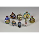 A collection of eight enamel decorated 20th century and earlier Chinese snuff bottles of varying
