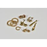 A small collection of 9ct gold earrings to include a pair of tight twist loop earrings and a single