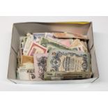 A large quantity of various Worldwide banknotes mostly used, creased etc, to include