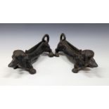 A pair of heavy cast metal novelty boot scrappers fashioned as Dachshunds. (2)