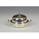 A small silver twin handled dish & cover Mappin & Webb Ltd., London 1936, circular form with domed
