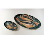 Two Jersey Pottery oval platters with fish design