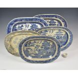 A collection of five Victorian blue and white meat platters to include four in the 'Willow'