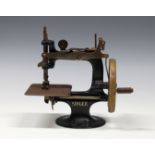 A Singer child's toy sewing machine early 20th century