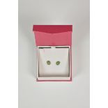 A pair of 9ct yellow gold and jade stud earrings