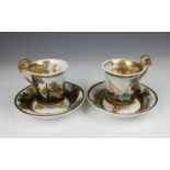 A pair of Dagoty Paris porcelain style cabinet cups and saucers