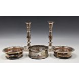 A pair of electroplated candlesticks on copper, 8½in. (21.7cm.) high; together with various silver