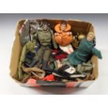 Three Action Man figures and a quantity of clothing and accessories. (large quantity)
