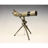 A mid-century Japanese spotting telescope with rotating eyepiece turrets, ranging between 20x and