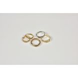 A small collection of five 9ct gold rings comprising a three colour ladies Russian wedding ring,