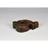 A vintage Persian / Indian wooden bindi box of carved boteh (teardrop) form, having pivot cover,