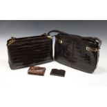 A pair of vintage crocodile skin handbags unmarked, includes a wallet and compact mirror.