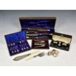 A collection of antique cased silver plated cutlery comprising a cased horn carving set by Mackey