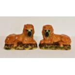A pair of antique Scottish Bo'ness Pottery recumbent lions, mantel/fireside ornaments13in. (33cm.)