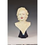 A painted ceramic bust of Marilyn Monroe 20in. (50.75cm.) high.