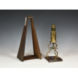 An early 19th century English brass Culpepper type microscope with assorted accessories and