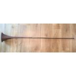 An antique copper and brass coaching horn of typical form, stamped 'LONDON TO CHESTER', 46¾in.