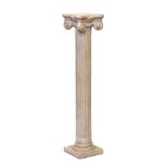 A composition classical Doric column by Austin Products, signed to base, 42½in. (108cm.) high.