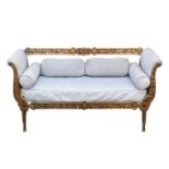 A French gilt brass settee in the Louis XVI style, 20th century, with foliate and fruiting vine