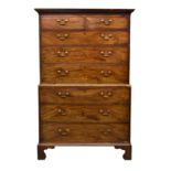 A George III mahogany chest on chest, the shallow moulded cornice over two short and three long