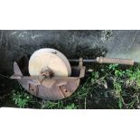 An antique cast iron and stone knife grinder,