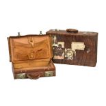A vintage crocodile skin suit case by The North West Tannery & Co Ltd of Cawnpore, having original