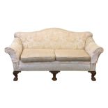 A Victorian or Edwardian camel back settee suite, in the George II style