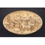 A pair of plaster, faux-carved ivory relief oval plaques, early 20th century, Continental, both
