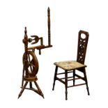 A turned beech wood spinning wheel, second half 20th century, 39in. (99cm.) high; together with a