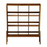 A 1960s-70s teak small freestanding bookcase, the square open bookcase raised on inverted V-shaped