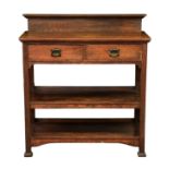 An Arts and Crafts oak buffet, early 20th century, the rectangular top with short upstand to back,