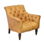 A pair of modern tan buttoned leather armchairs, with square back and slightly flared arms, on
