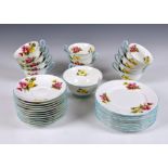 A partial set of eleven Shelley Begonia pattern trios, each trio comprising a tea cup, saucer and