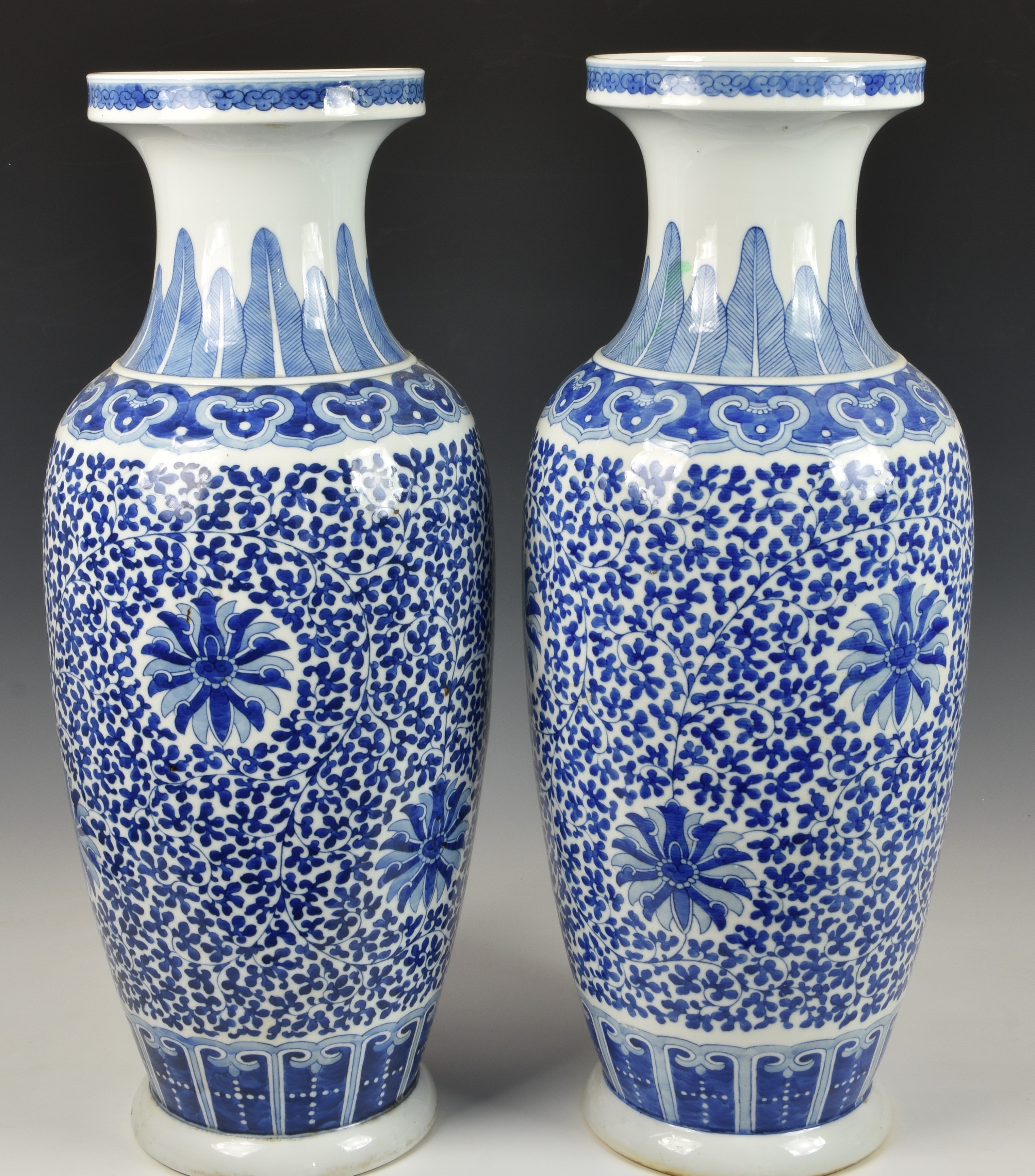 A pair of large Chinese blue and white lotus scroll baluster vases, 20th century, decorated with - Image 2 of 3