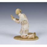 Audrey Blackman (British, 1907-1990), a rolled clay figure of a kneeling Chinaman at prayer,