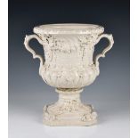 A creamware pottery two handled urn by Peter Weldon, 1990s, purchased from the General Trading