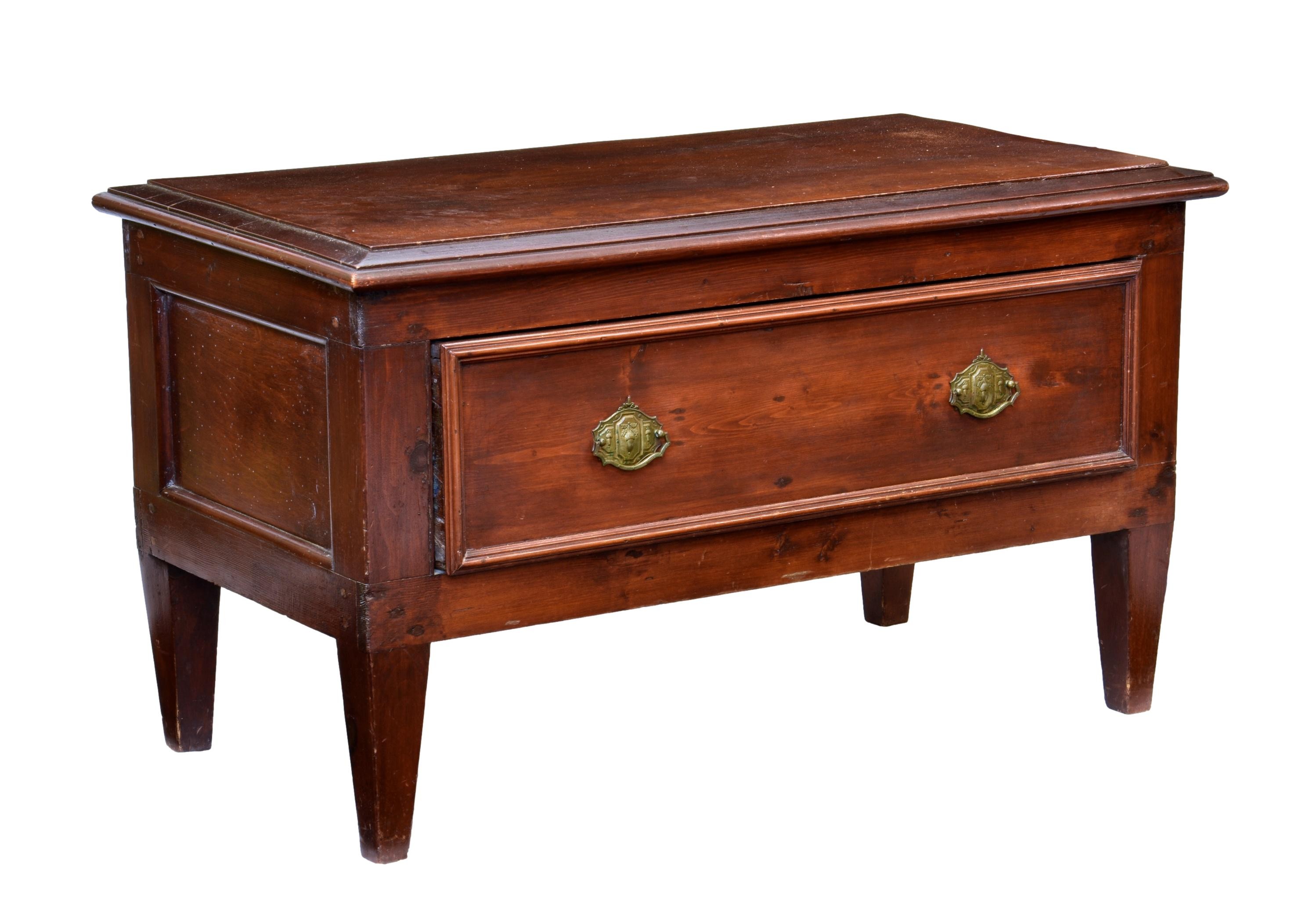 A late Victorian stained pine and beechwood linen chest, the chamfered top over a single full