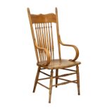 An ash and elm spindle back chair, early 20th century, with bentwood arms and turned legs united