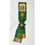 An Ancient Order of Forresters Jersey sash, in green, with applied jewels and crest with gold