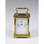 An antique French carriage clock, c.1900, single train movement, the white enamel dial signed R &