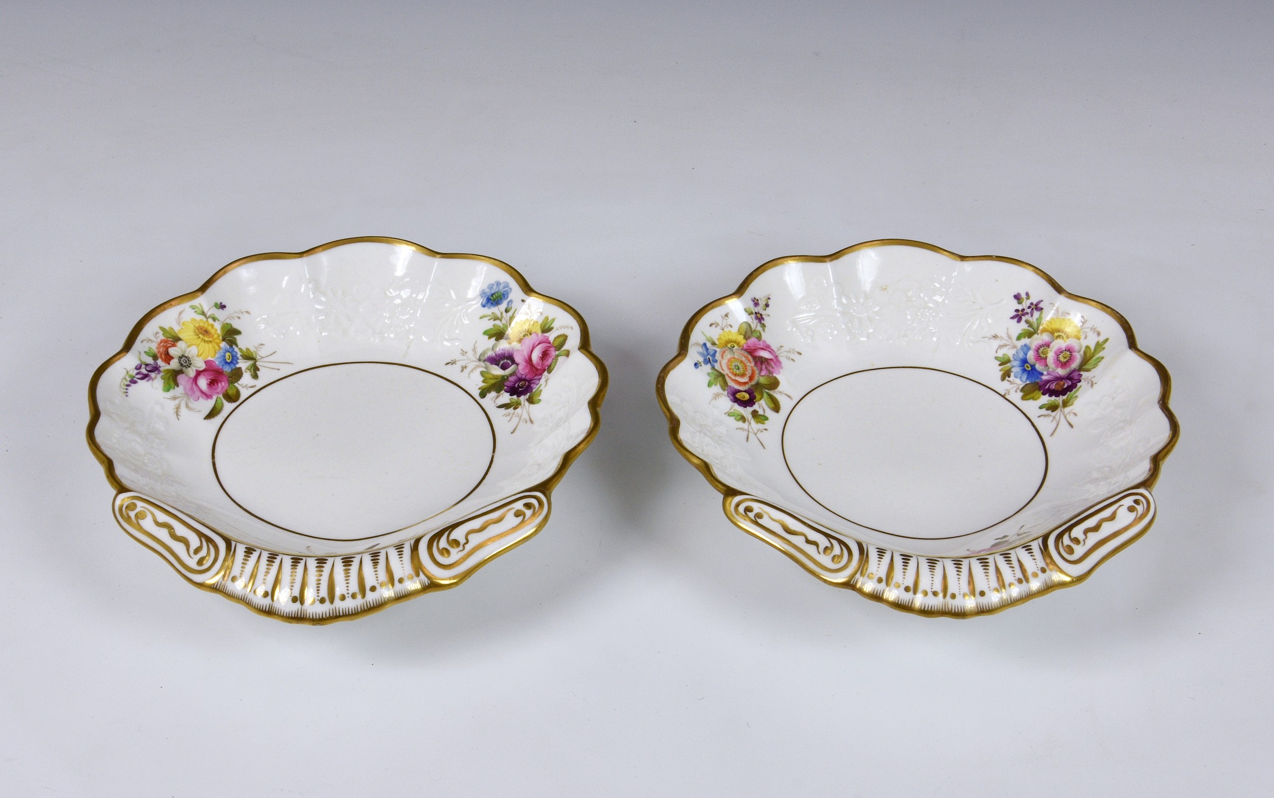 A pair of Spode shell shaped dessert dishes, 1820s-30s, the scalloped dishes with moulded floral