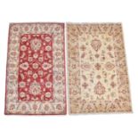 Two small Indian Ziegler rugs, late 20th century, one with a madder field, the other a buff field,