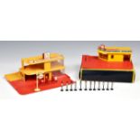 A Lesney 1-75 Series Matchbox Garage Showroom & Service Station, with yellow plastic building and