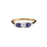 An 18ct gold, diamond and sapphire five stone ring, set with alternating old-cut diamonds and