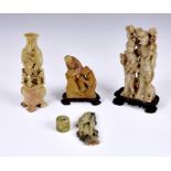 Two Chinese soapstone carvings, probably 19th / early 20th century, one in ochre and russet stone,