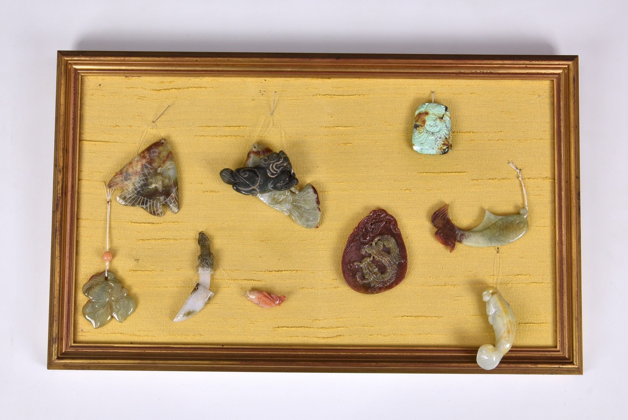 A small collection of modern Chinese jade and stone carvings, to include various fish in different