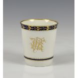 An early 19th century Worcester beaker, of plain, tapered form with cobalt blue and gilt foliate