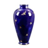 R F Dore Sèvres porcelain vase, of tapered ovoid form, cobalt mottled blue, with gilt moth and