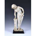 An alabaster figure of a nude maiden, probably early 20th century, unmarked, the figure in