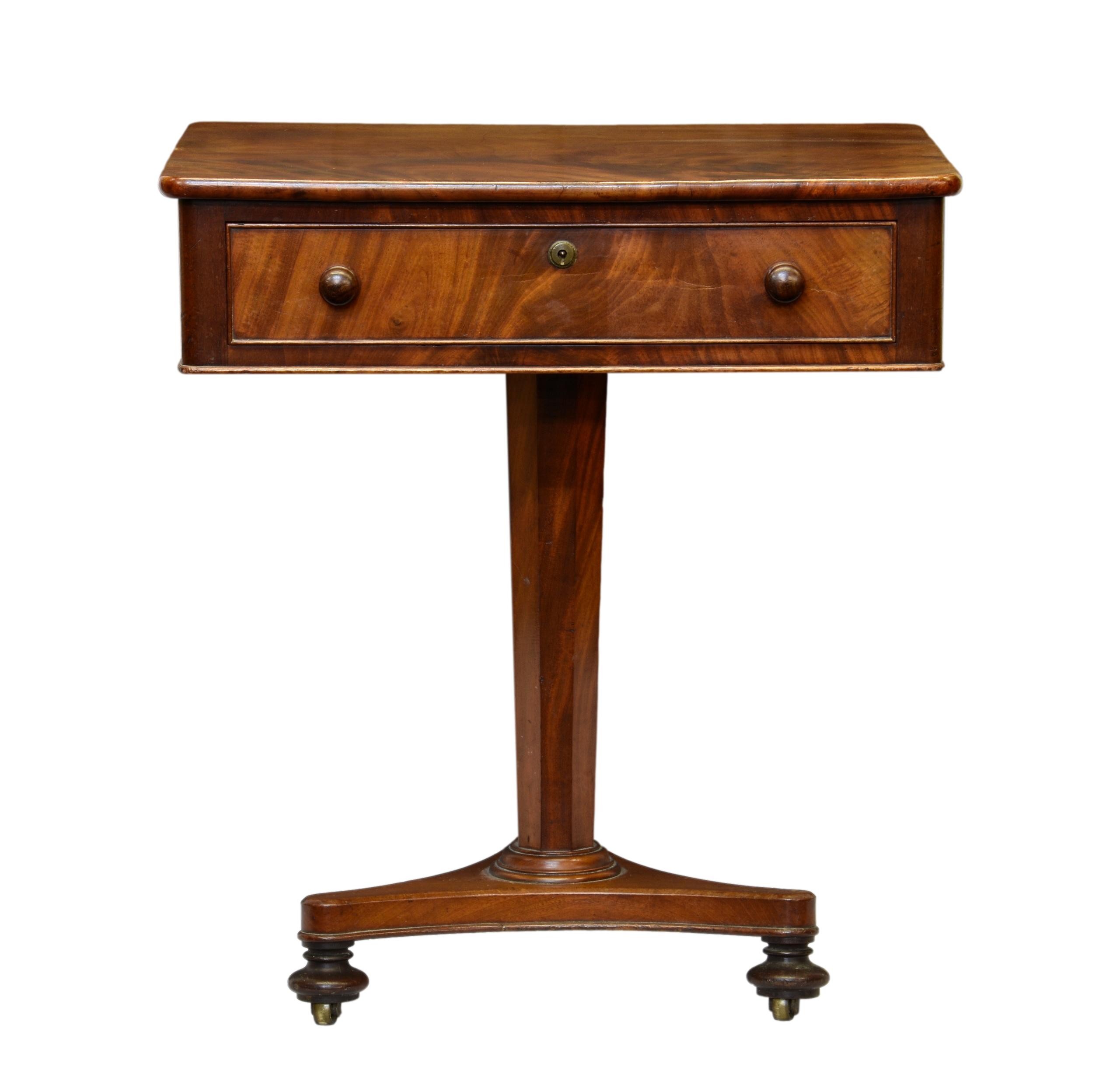 A small early Victorian mahogany centre table, the rounded, rectangular top with a single drawer